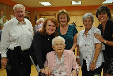 (From left to right: The Buzzell Family, volunteer organizer Audrey Reed, Senior Center Director Terri Marciello)