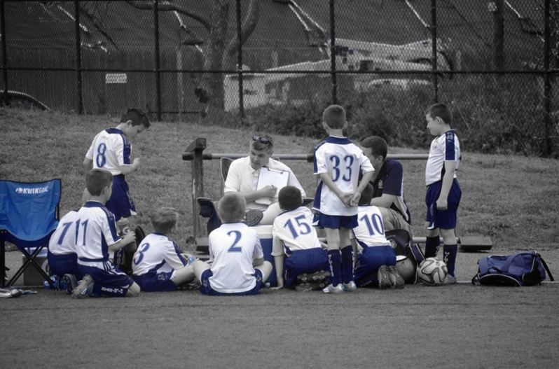 Travel Boy U9-1 - Coach Lanagan draws up a play at halftime