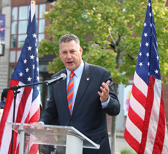 Sheriff Koutoujian speaking at naturalization ceremony
